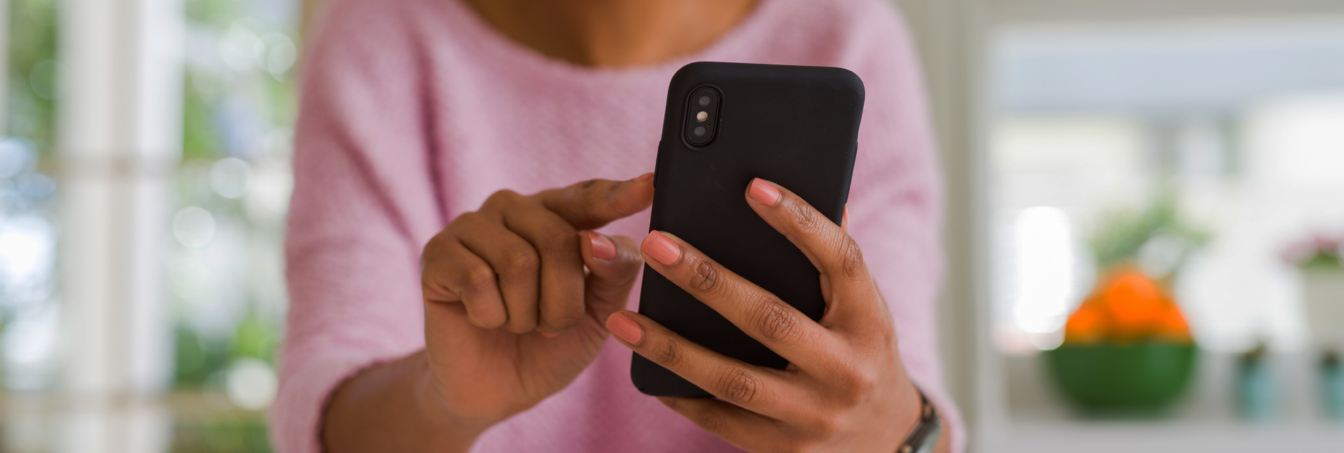 hands touching phone